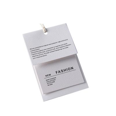 China Sustainable Brand Clothing Custom Hang Tags Logo Shoes Jeans Clothes Black Swing Tag for sale