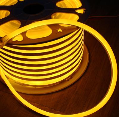 China 50m spool anti-UV full waterproof IP68 led flex neon strip 24vsmd flexible soft tube yellow emitting mini 7*15mm for sale