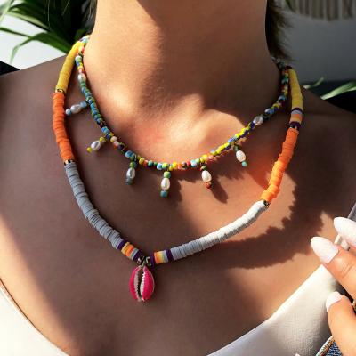 China TRENDY Simple Style Summer Holiday Colorful Shell Bead Necklace Multilayer Color Soft Pottery Necklace for sale