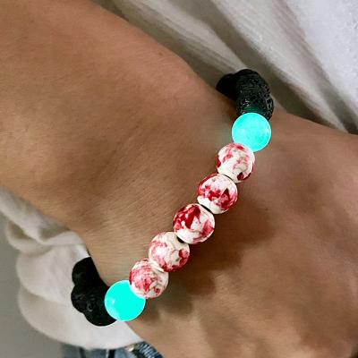 China Cute Handmade Halloween Gemstone Volcanic Energy Beaded Skull Bead Bracelet For Women Men for sale