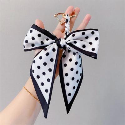 China Fashion new color silk bow daily life silk car buckle women's bag main pendant horseshoe accessories for sale