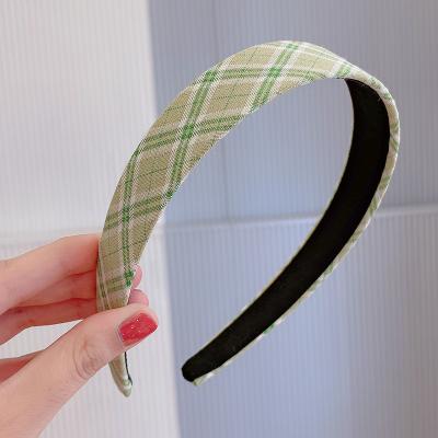 China Daily lifestyle boutique lattice fabric headdress simple solid color wide headband headband for women for sale