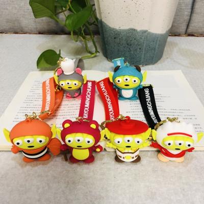 China Cartoon Anime Customize Design Luxury Embossed Cartoon Three Eyes Doll Rubber Key Chain Cute Alien Promotion Pendant Bag for sale