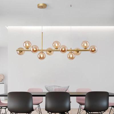 China Modern Island Light Glass Magic Bean Pendant  Nordic Style Design Ding Room Chandelier With Long Creative Bar Counter Lighting for sale