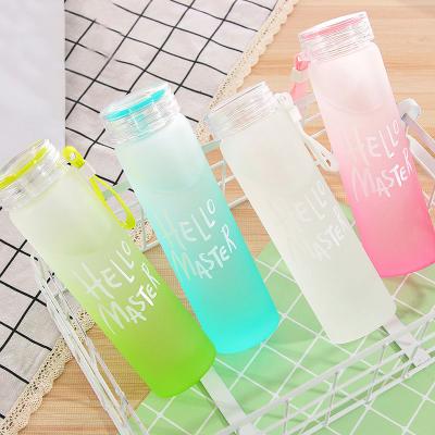 China Custom Viable Wholesale Color Letter Glass Environmentally Friendly Colorful Water Bottle With Cloth Cover Frosted Portable Bottle Glass for sale