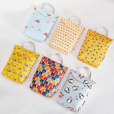 China Mommy Storage Bag Travel Diaper Bag Wet/Dry Bag Function Wet/Dry Bag Baby Diaper Organizer Reusable Waterproof Fashion Multi Printing for sale