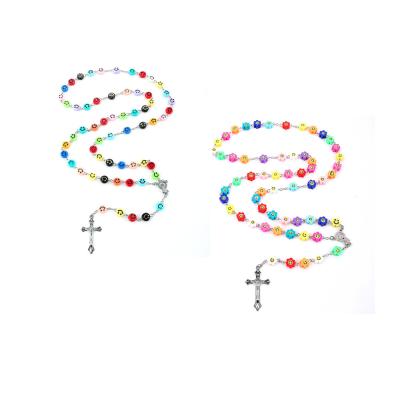 China Fashion Soft Simple Multicolor Flower Resin Pottery Face Bead Necklaces Smile Cross Pendant Jewelry For Women for sale