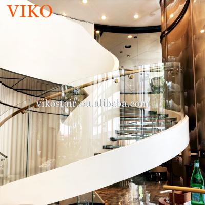 China VIKO Modern Staircase Inward-Bearing Stringer Curved Staircase Spiral Staircase Hidden Stylish White. for sale