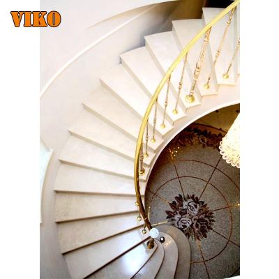 China Modern VIKO curved marble staircase with marble tread and wrought iron handrail for sale