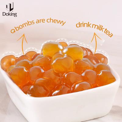 China Hot Selling Doking Product Tapioca Pearls Amber Tapioca Pearl Golden Tapioca Pearls For Bubble Tea Desserts Milk Boba Tea Round for sale