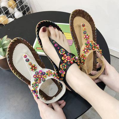 China 2021 New Women's Shoes Anti-skid Beaded Spring Clip Bohemian Foot Sandals Flat Women's Beach Shoes for sale