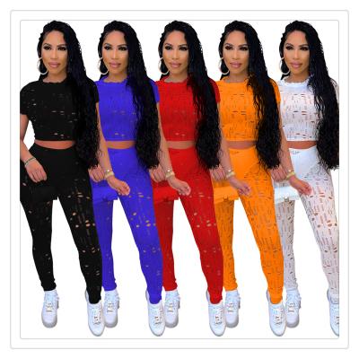 China Spring Viable Summer Multicolor S M L XL 2XL Plus Size Pants Suit Fashion Hole Fabric Soft Short Sleeve Solid Color Two Piece Sets for sale