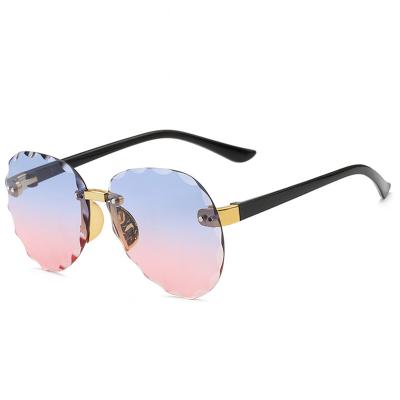 China New Fashion Little Girl Frame Sun Glasses Kids Sunglasses Rosie Flower Optical Oversized Frame Cute Round Rimless Eyewear Shaped Rimless Sunglasses for sale