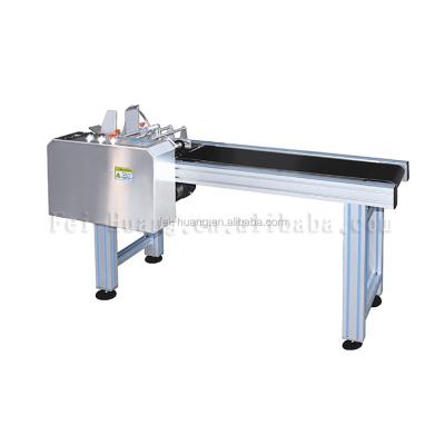 China Automatic Food Top Selling Low Cost Shrink Pouch Packing Machine For Food for sale