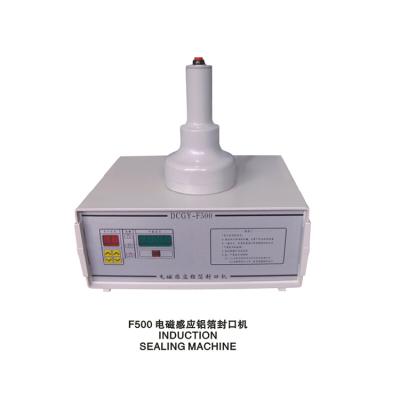 China Beverage High Efficiency Capping Machine Plastic Bottle , Hand Held Induction Heat Sealing Machine for sale