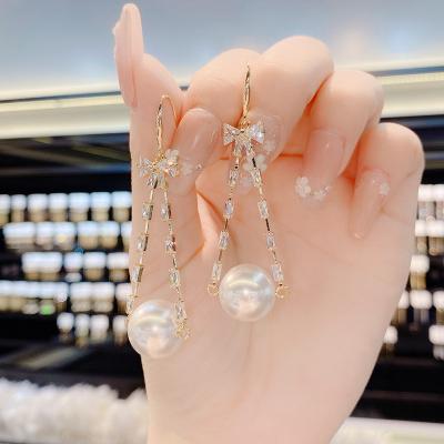 China FASHIONABLE Korean Girls Women Earring Bow Butterfly Zircon Bling Drop Earring Pearl Personality Dangle Earring for sale