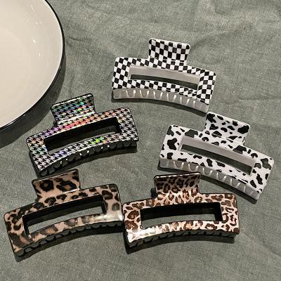 China Fashion Bundle Fashion Hair Clip Jaw Clip Cow Back Head Leopard Print Shark Hair Clip Women Hair Claw Clips for sale