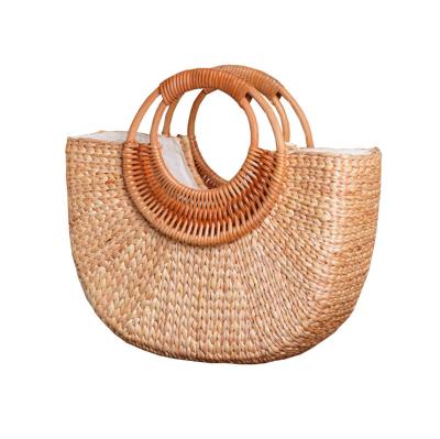 China Summer Vacation Handled Half Moon Shape Handbag Large Straw Tote Bags Rattan Round Woven Beach Bag Straw Beach Bag Hand Make for sale