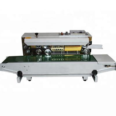 China Horizontal Continuous Food Plastic Bag Strip Vacuum Sealer Machine FR900 for sale