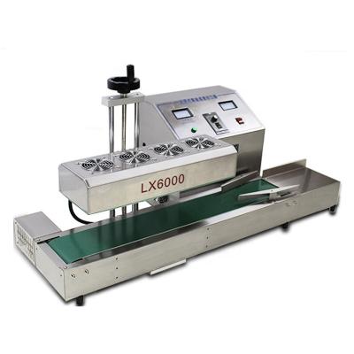 China LX-6000 continuous beverage induction/automatic aluminum foil bottle oil can sealing machine for sale