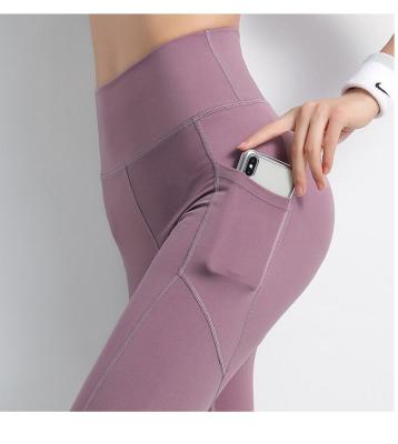 China 2020 Boutique Women Legging Manufacturer Side Phone Pocket Solid Color Sports Antibacterial Yoga Pants Butt Lift for sale