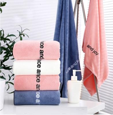 China Velvet Bath Towel QUICK DRY LOGO High Density Coral Embroidered Bath Towel for sale