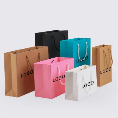 China Disposable Factory Custom Washable Gift Bag Clothing Package Paper Packaging Bag Washable Shopping Paper Tote Bag for sale