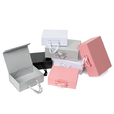 China New Material Design Magnetic Cardboard Recycled Folding Paper Folding Gift Box for sale