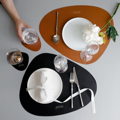 China Sustainable Durable Leather Place Mat For Dining Table Mat Non-Slip Leather Disc Coaster PU Heat Insulation Place Mat Placemat Table Pad Tableware for sale