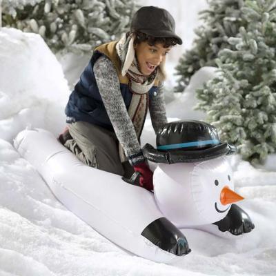 China Kids PVC Cold and Wear-resistant Material Inflatable Snowboard Snowman Ski Ring Winter Christmas Sled for sale