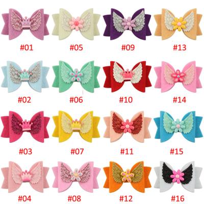 China Popular Nonwoven Colorful Hair Bow With Clips Handmade Boutique Hair Accessories Clips for sale