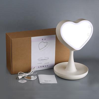 China Lighted Heart Shaped Touch Screen Lighted Vanity Led Makeup Mirror With Lights for sale