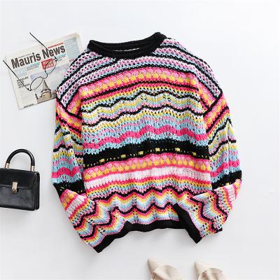 China Anti-wrinkle Women Rainbow Sweater Multi Color Blocked Pullover Women Rocket Sleeve Hollow Knitted Casual Sweater for sale