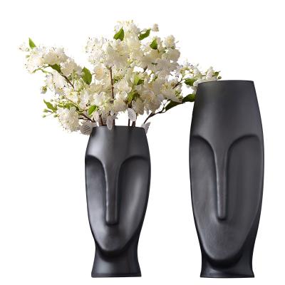 China Nordic minimalist style abstract portrait vase flower arrangement hotel entrance decoration glass home decor for sale