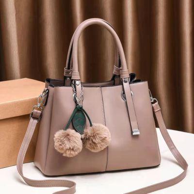 China 2021 Lady Pom Pom Waterproof Trendy Large Capacity Shopping Bags Women Handbag Bags for sale