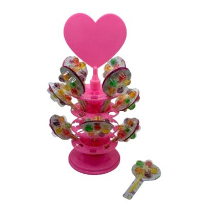 China Pp Halal manufacturer cartoon design windmill hard sweet and sour fruit lollipop candy toy for sale