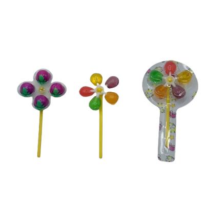 China Pp Colorful Windmill Fudge Spinning Lollipop Children's Leisure Creative Candy Snacks for sale