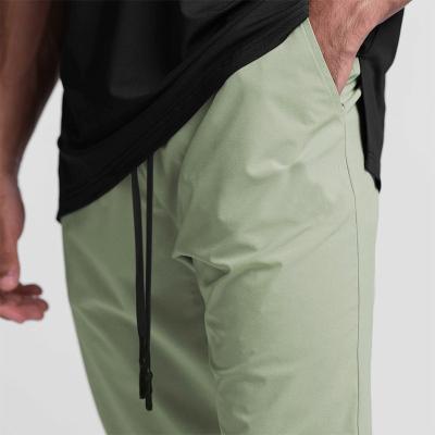 China Odm Breathable Quick-drying OEM Elastic Men Sports Pants Fitness Sports Casual Pants for sale