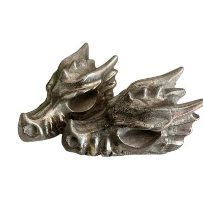 China High Quality Pyrite Crystal Carved Dragon Head Skulls from Europe Polished Statue for Home Decoration for sale