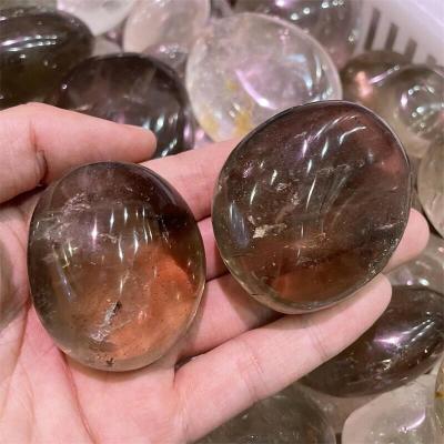 China Wholesale Natural Oval Dark Smoky Quartz Crystal Stone Palm For Healing Reiki From Europe for sale