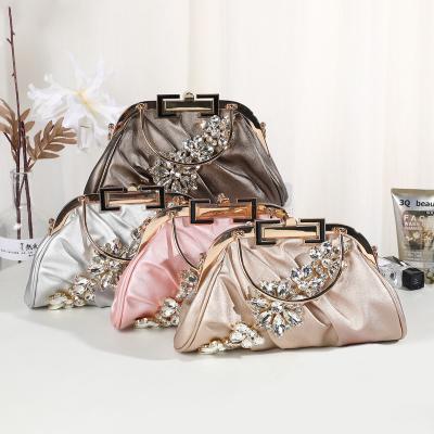 China Wholesale Custom Detachable Party Bag Ladies PU Fashion Temperament Hand Dinner Bag Flower Cutout New Inlaid Diamond Lock Bag Chain Wholesale for sale