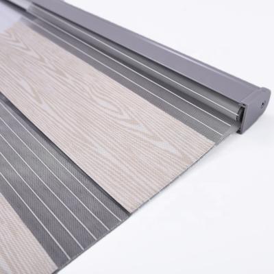 China Anti-UV / Light Filtering 2022 Good Selling Fabric Zebra Head Rail Panel Electric Blinds for sale