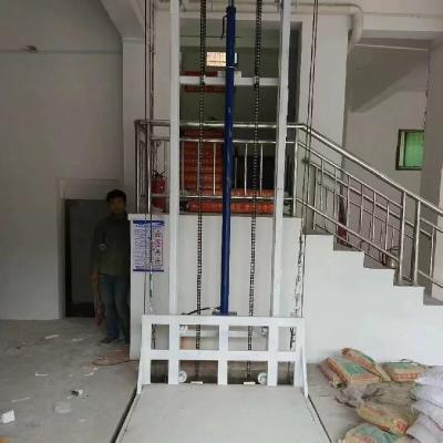 China Hydraulic Cargo Lift Platform With Safety Interlock And PLC Control 1-12 Meters Lifting Height for sale