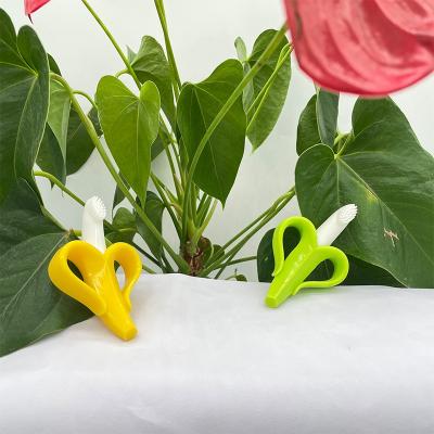 China Soft Material Is A Toothbrush That Can Clean Genuine Silicone Toothbrush High Quality Mouth.etc Baby Food Grade Safe Material Banana Shape Baby Silicone Toothbrush Baby Teether for sale