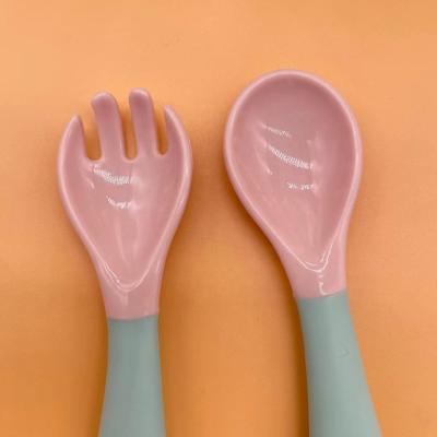 China Wholesale High Quality BPA Free Baby Spoons And Forks Soft Rubber Band Twistable Baby Spoon for sale