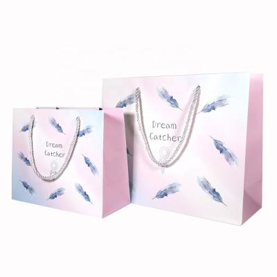 China Custom Logo Wholesale Luxury Paper Bag Jewelry Packaging Materials Recycled Gift Paper Bag Gift Shopping Paper Bag for sale