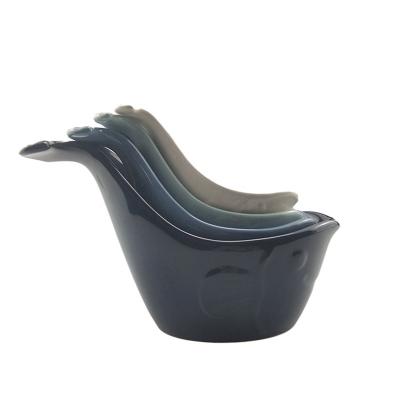 China Sustainable Set Of 4 Novelty Colorful Kitchen Cute Whale Shape Ceramic Measuring Cups for sale