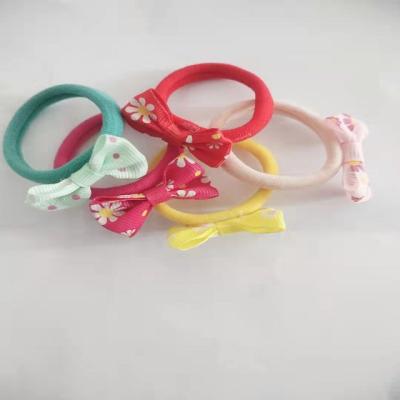 China Reusable 2021 best-selling children's beautiful bow headband is a durable headband that will not damage your hair for sale