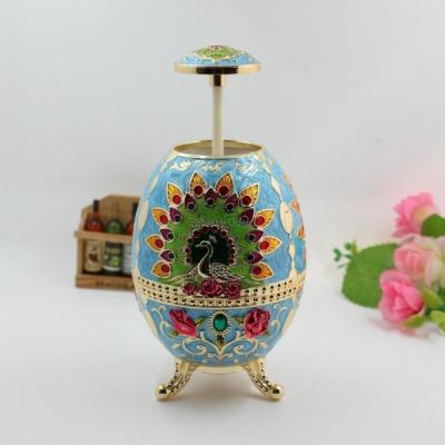 China Sustainable Enamel Metal Egg Shape Metal Toothpick Holder for sale