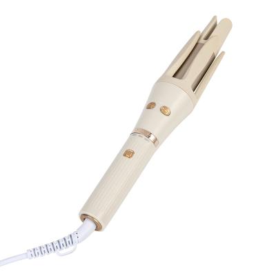 China Wave Hair Curling Rotating Curler hair Automatic curling stick Electric negative ion curling stick Non injurious hair roller Big wave curler for sale